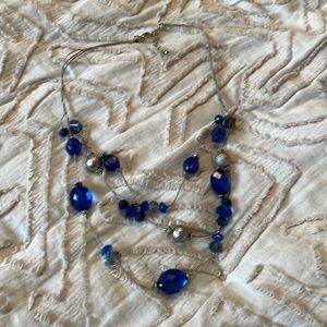 Triple lawyer blue and silver beaded necklace
